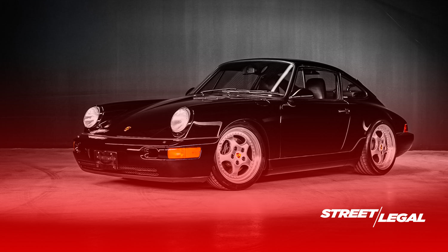 Porsche 911 (964) showcasing aerodynamic design