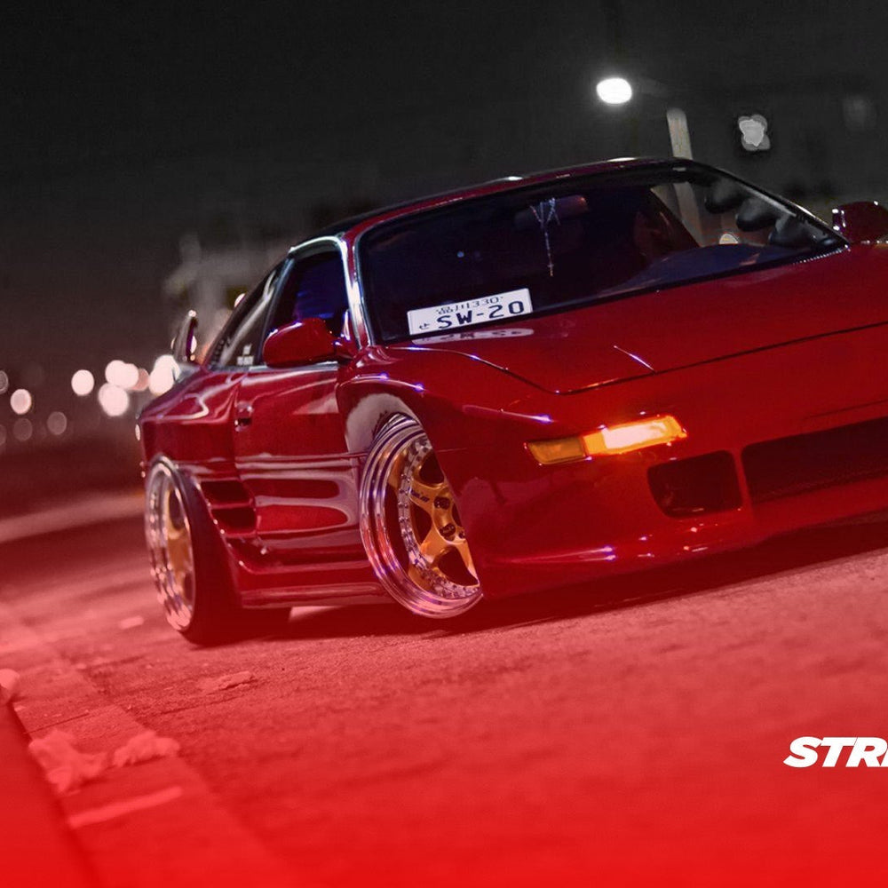 Toyota MR2 SW20 turbo model in red, side profile