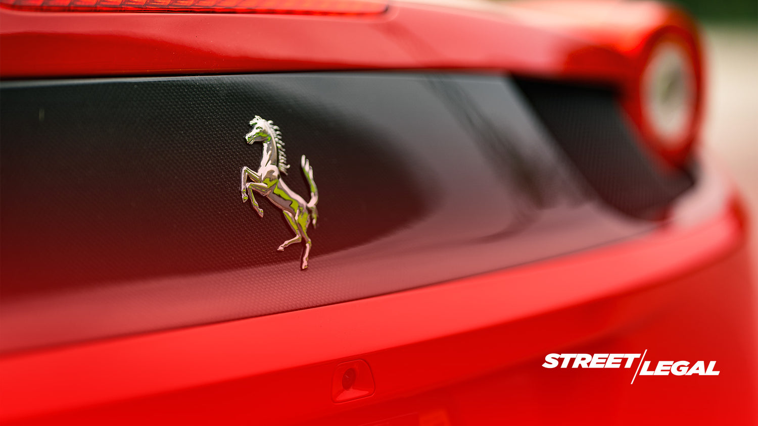 Street Legal Rear view of Ferrari 458 Spider showcasing its legendary design.